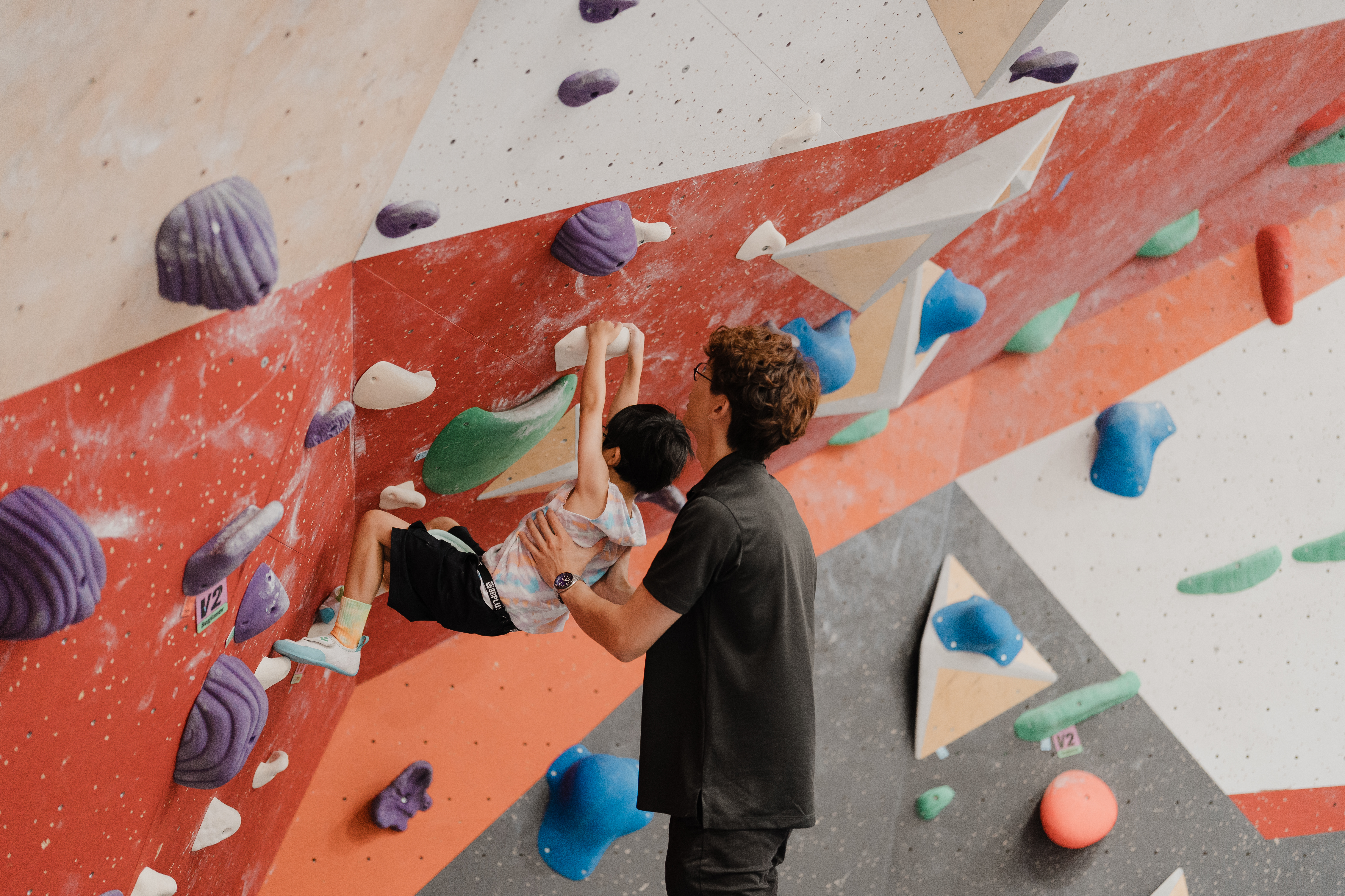 Climbing therapy session - participant on climbing wall